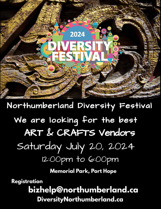 a carved piece of wood with a logo showing diferent colours and shapes with the text Northumberland Diversity Festival